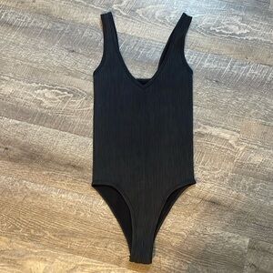 Brand new ribbed spandex bodysuit